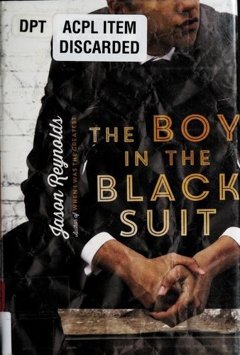 The boy in the black suit
