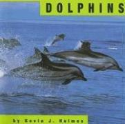 Dolphins (Animals) by Kevin J. Holmes cover