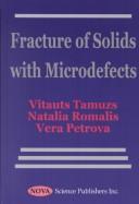 Fracture of Solids with Microdefets